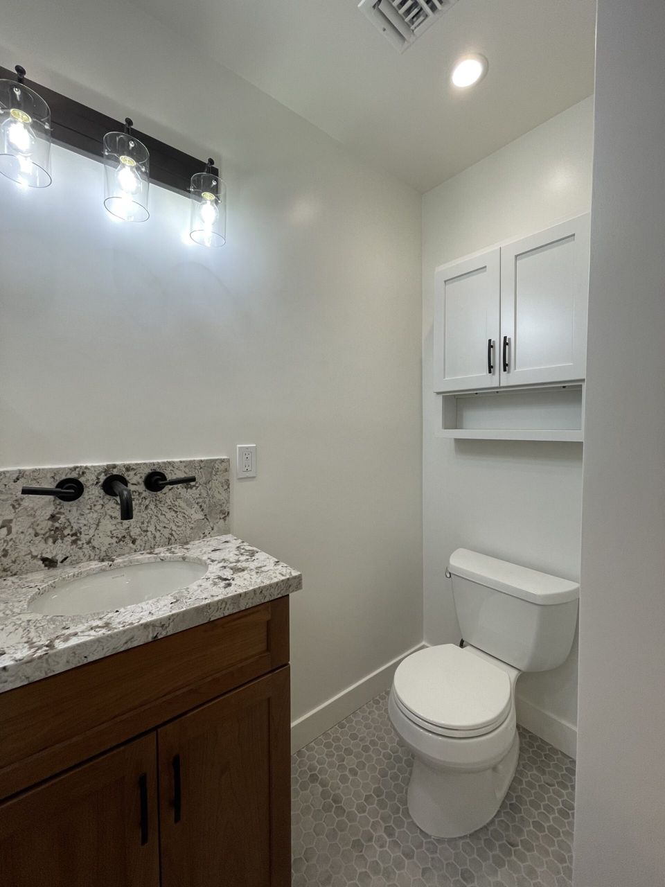 Bathroom remodel: vanity and storage detail