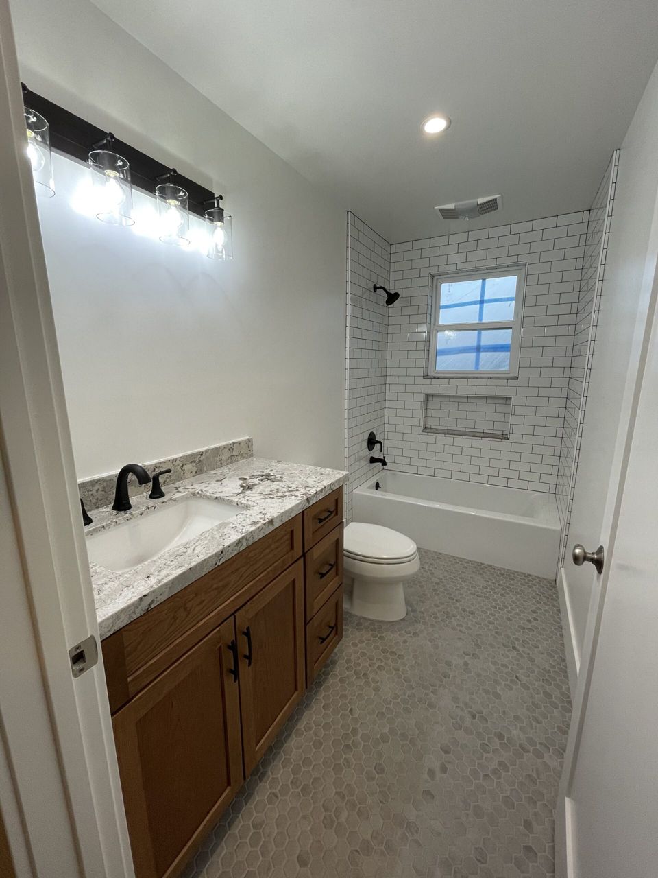 Bathroom remodel: vanity, subway tile, tub/shower