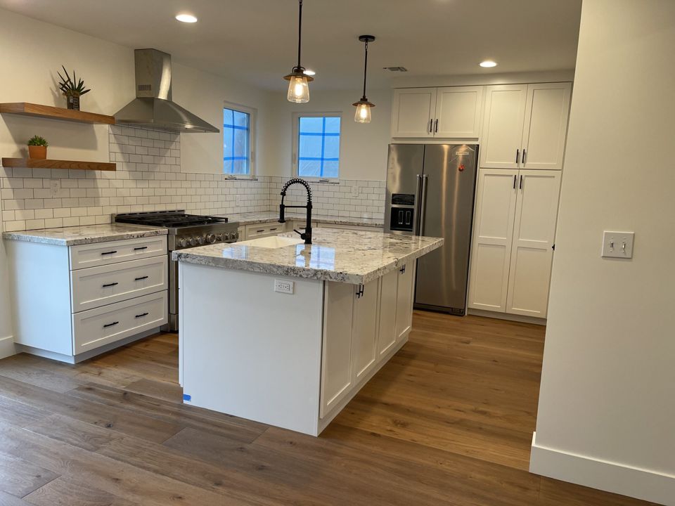 Kitchen remodel: island, farmhouse sink, open plan
