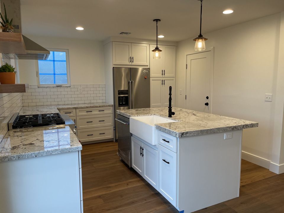 Kitchen remodel: range wall and floating shelves